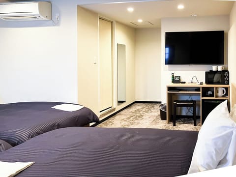 Triple Room, Smoking | Desk, iron/ironing board (on request), WiFi (free), bed sheets