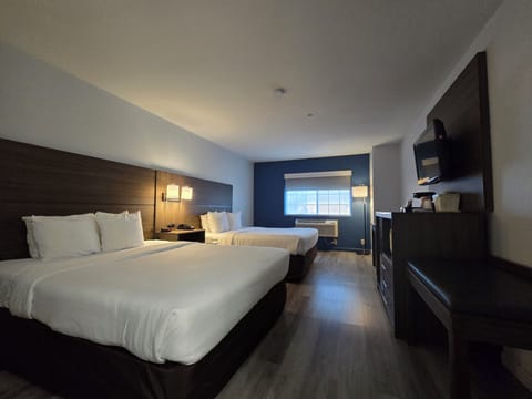 Standard Room, 2 Queen Beds, Non Smoking | Down comforters, pillowtop beds, desk, blackout drapes