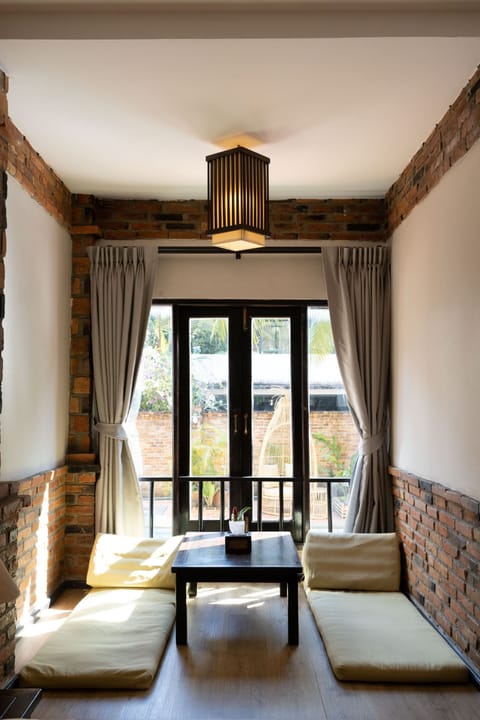 Deluxe Pool Access | Living area | 24-inch LED TV with digital channels