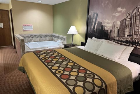 Suite, 1 King Bed | Desk, iron/ironing board, cribs/infant beds, free WiFi