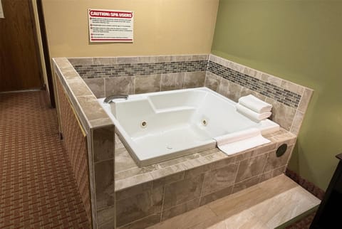 Suite, 1 King Bed | Desk, iron/ironing board, cribs/infant beds, free WiFi