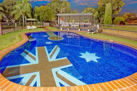 Outdoor pool, open 8:00 AM to 9:00 PM, pool umbrellas, sun loungers
