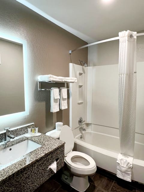 Desk, blackout drapes, iron/ironing board, free cribs/infant beds