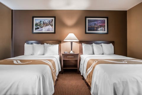 Premium bedding, desk, iron/ironing board, free cribs/infant beds