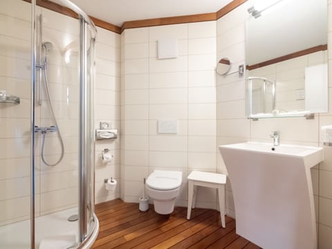 Deep soaking tub, eco-friendly toiletries, hair dryer, slippers
