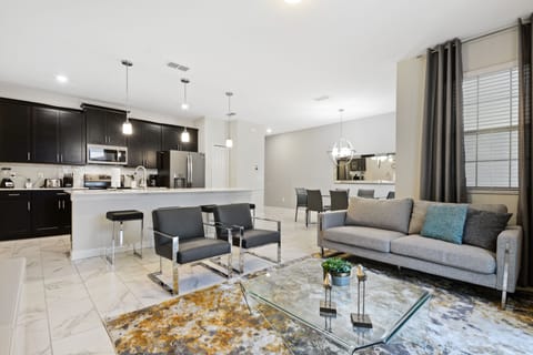 Townhome, 4 Bedrooms | Living area | 60-inch Smart TV with cable channels, TV, Netflix