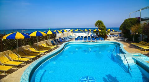 Outdoor pool, pool umbrellas, sun loungers