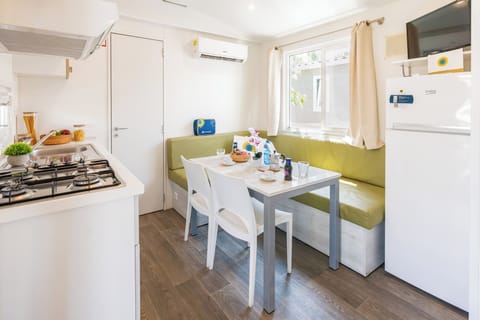 Comfort Mobile Home (Pet Friendly) | Living area | Flat-screen TV, table tennis