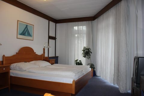 Down comforters, desk, blackout drapes, free WiFi