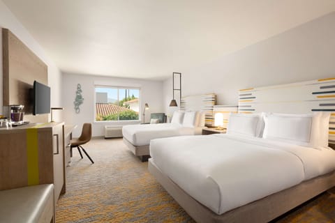 Premium bedding, down comforters, in-room safe, blackout drapes