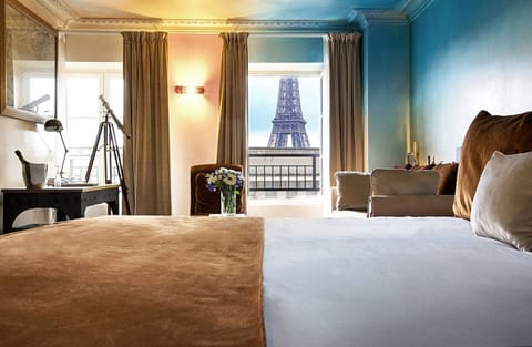 Suite (Eiffel) | Minibar, in-room safe, individually decorated, desk
