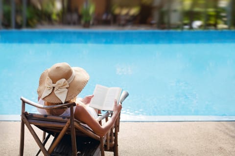 Seasonal outdoor pool, open 10:00 AM to 8:00 PM, pool umbrellas