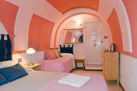 Economy Double Room (External Private Bathroom) | Minibar, in-room safe, desk, blackout drapes