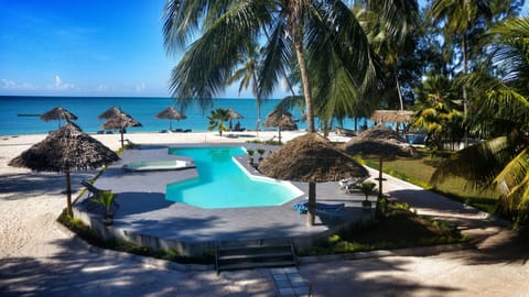Private beach, white sand, sun loungers, beach umbrellas