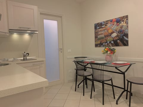 Apartment, 1 Bedroom, City View | Private kitchen | Fridge, stovetop, coffee/tea maker, electric kettle