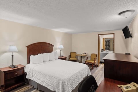 Desk, blackout drapes, iron/ironing board, travel crib