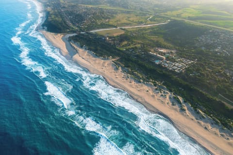 On the beach, white sand, surfing