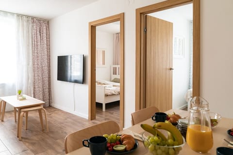 Apartment, 2 Bedrooms | Living room | Flat-screen TV