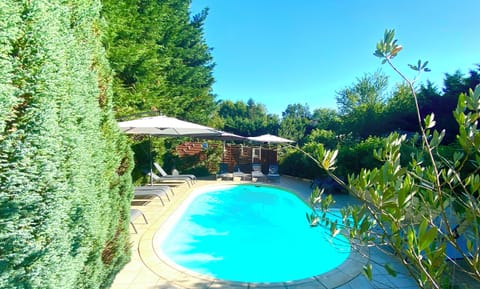 Seasonal outdoor pool, open 10:00 AM to 8:00 PM, sun loungers