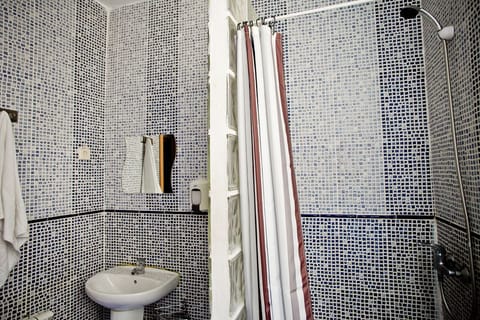 Basic Triple Room, Shared Bathroom | Bathroom | Shower, hair dryer