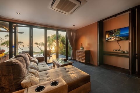 Beachfront Jacuzzi Pool Villa Two Bedroom Duplex with Lounge | Living area | 34-inch flat-screen TV with cable channels, TV