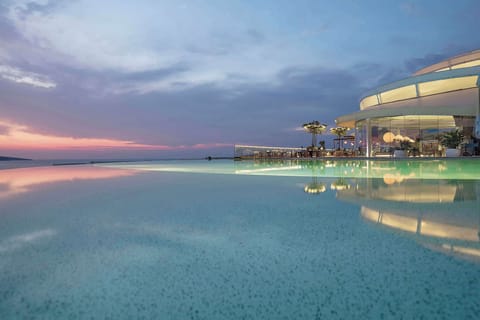 Seasonal outdoor pool, cabanas (surcharge), pool umbrellas