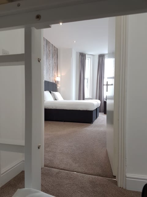 Family Room, Ocean View | Premium bedding, desk, iron/ironing board, bed sheets