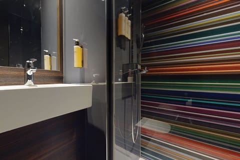 Rainfall showerhead, eco-friendly toiletries, hair dryer, towels