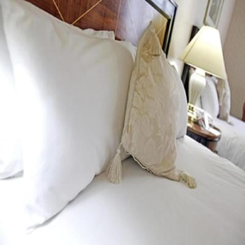 Desk, laptop workspace, free WiFi, bed sheets