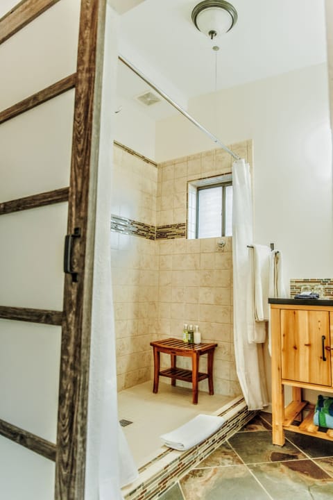 Designer toiletries, hair dryer, bathrobes, towels