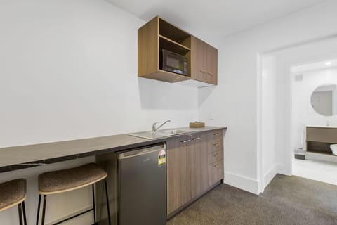 Family Room | Private kitchenette | Mini-fridge