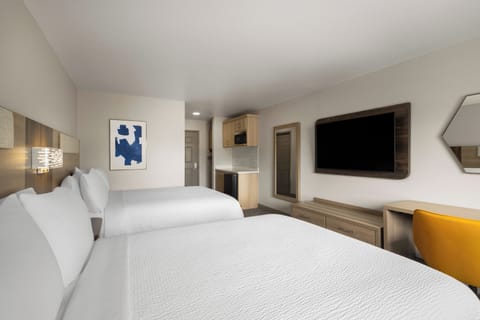 Pillowtop beds, desk, laptop workspace, blackout drapes