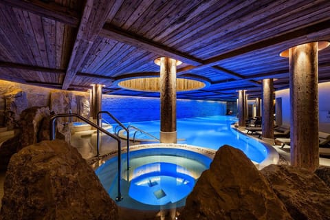 Indoor pool, outdoor pool, pool umbrellas, sun loungers