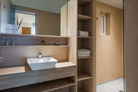 Designer toiletries, hair dryer, towels, soap