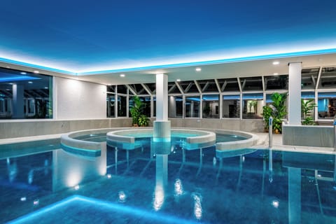 Indoor pool, seasonal outdoor pool, pool umbrellas, sun loungers