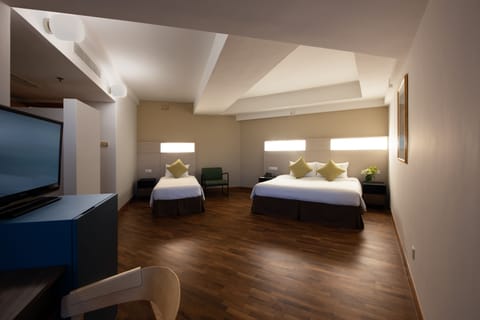 Family Triple Room | Premium bedding, minibar, in-room safe, desk