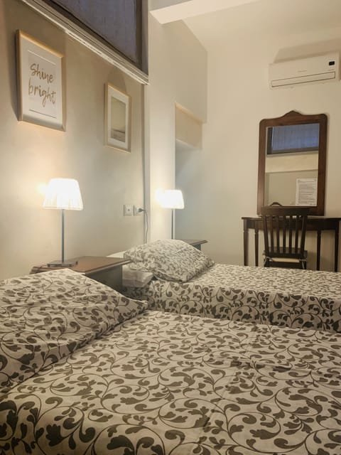 Double Room | Desk, blackout drapes, iron/ironing board, cribs/infant beds