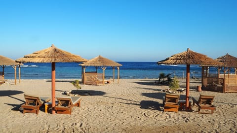 Private beach, sun loungers, beach umbrellas, beach towels