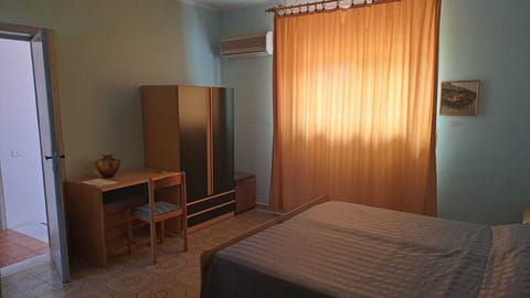 Economy Double or Twin Room, Partial Sea View | Minibar, desk, laptop workspace, bed sheets