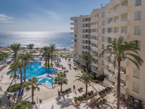 Outdoor pool, open 10:00 AM to 6:00 PM, pool umbrellas, sun loungers