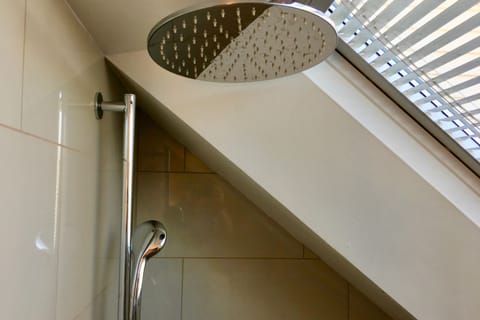 Designer toiletries, hair dryer, bathrobes, towels