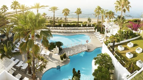 5 outdoor pools, open 10:00 AM to 7:00 PM, pool umbrellas, sun loungers