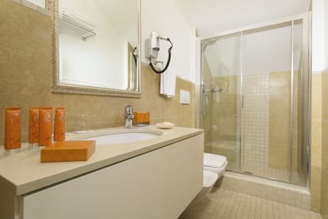 Eco-friendly toiletries, hair dryer, bathrobes, slippers