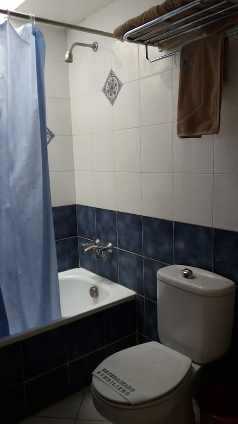 Economy Double Room, 1 Double Bed | Bathroom | Combined shower/tub, towels