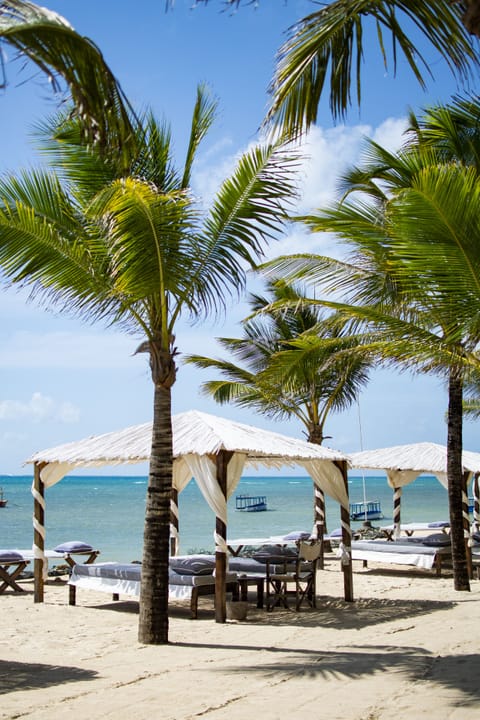Private beach, white sand, free beach shuttle, free beach cabanas