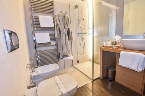 Rainfall showerhead, designer toiletries, hair dryer, bathrobes