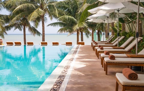 Outdoor pool, pool umbrellas, sun loungers