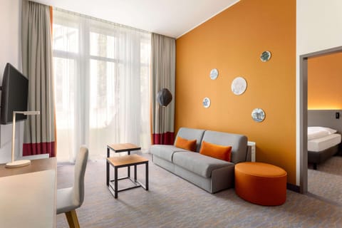 Hypo-allergenic bedding, desk, blackout drapes, soundproofing