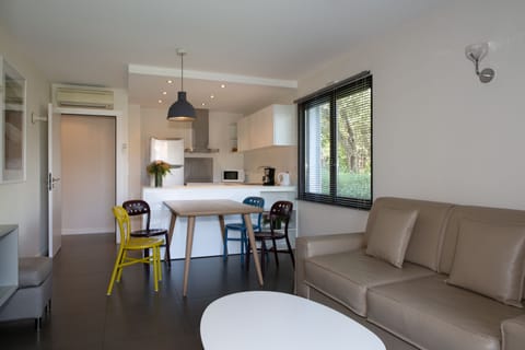 Apartment, 2 Bedrooms | Living room | 32-inch flat-screen TV with satellite channels, TV