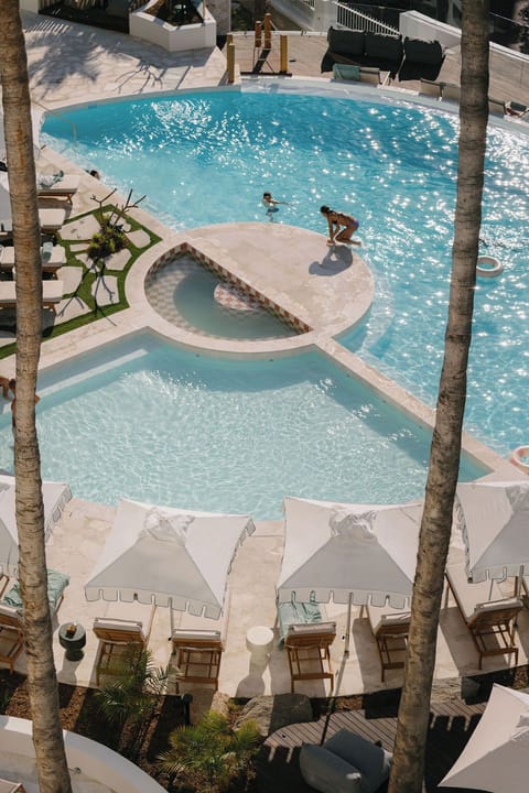 Outdoor pool, pool umbrellas, sun loungers